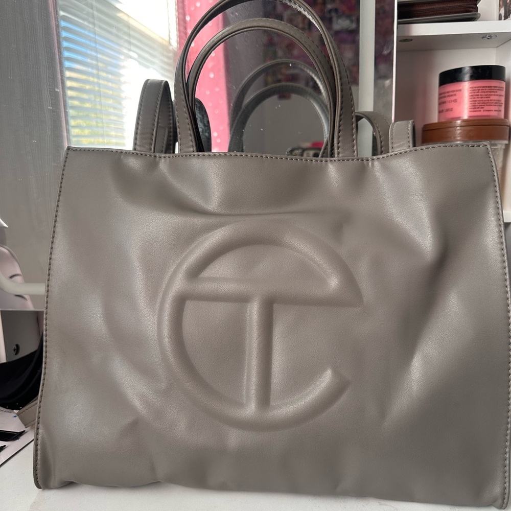 Grey medium sized Telfar bag